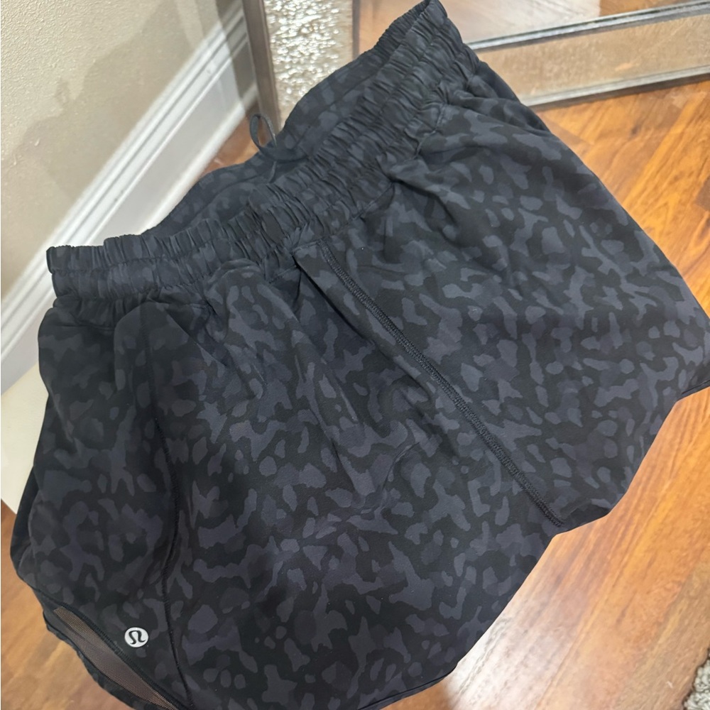 Size 8 Lululemon Hotty Hot shorts black leopard print 4”